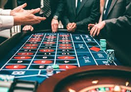 Mobile app interface showing live dealer table selection and sportsbook menu